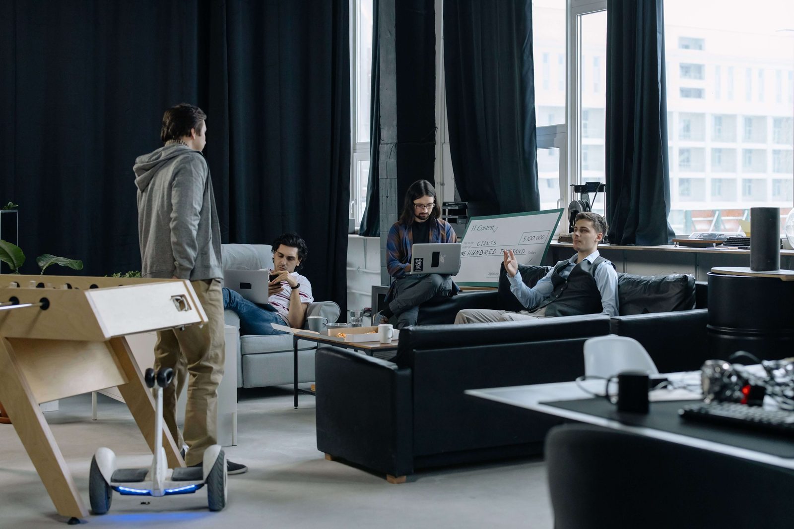 An in-house team working together in a company office